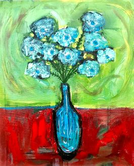 "Blue flowers on red table"